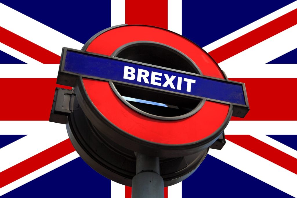 London Underground logo with "Brexit" lettering in front of the flag of Great Britain.