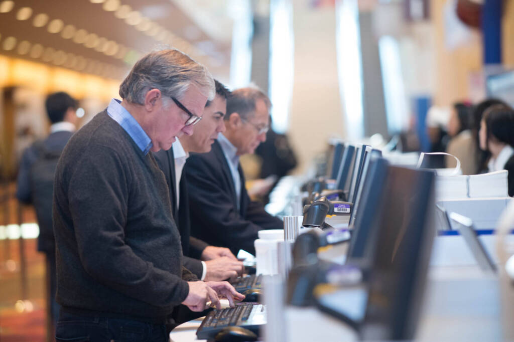 Registration underway at a previous American Coatings Conference.